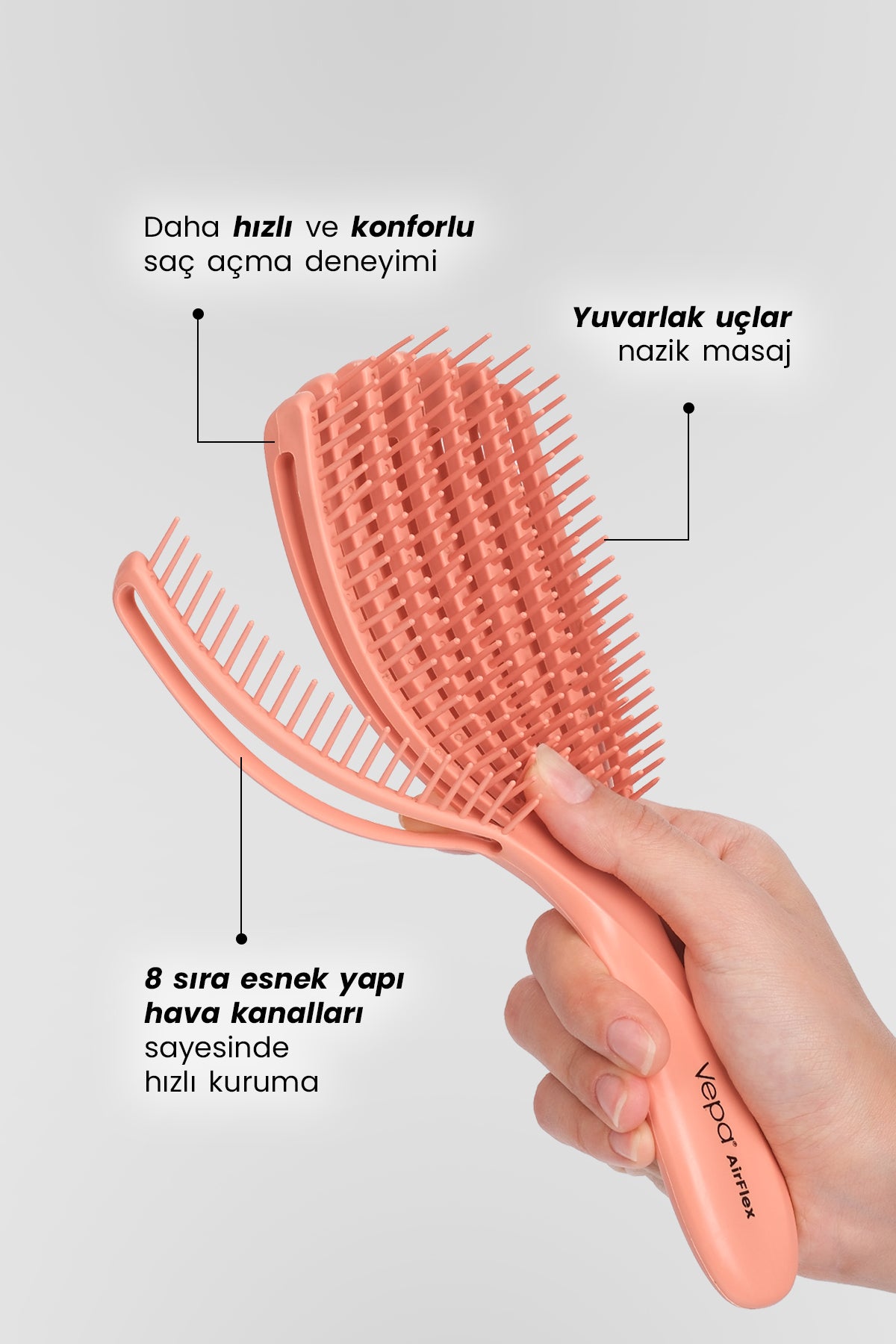 AirFlex Somon saç fırçası yakın çekim - esnek pimlerle nazik tarama